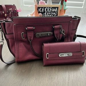 Dark purple Coach Purse and Wallet, lightly used.
